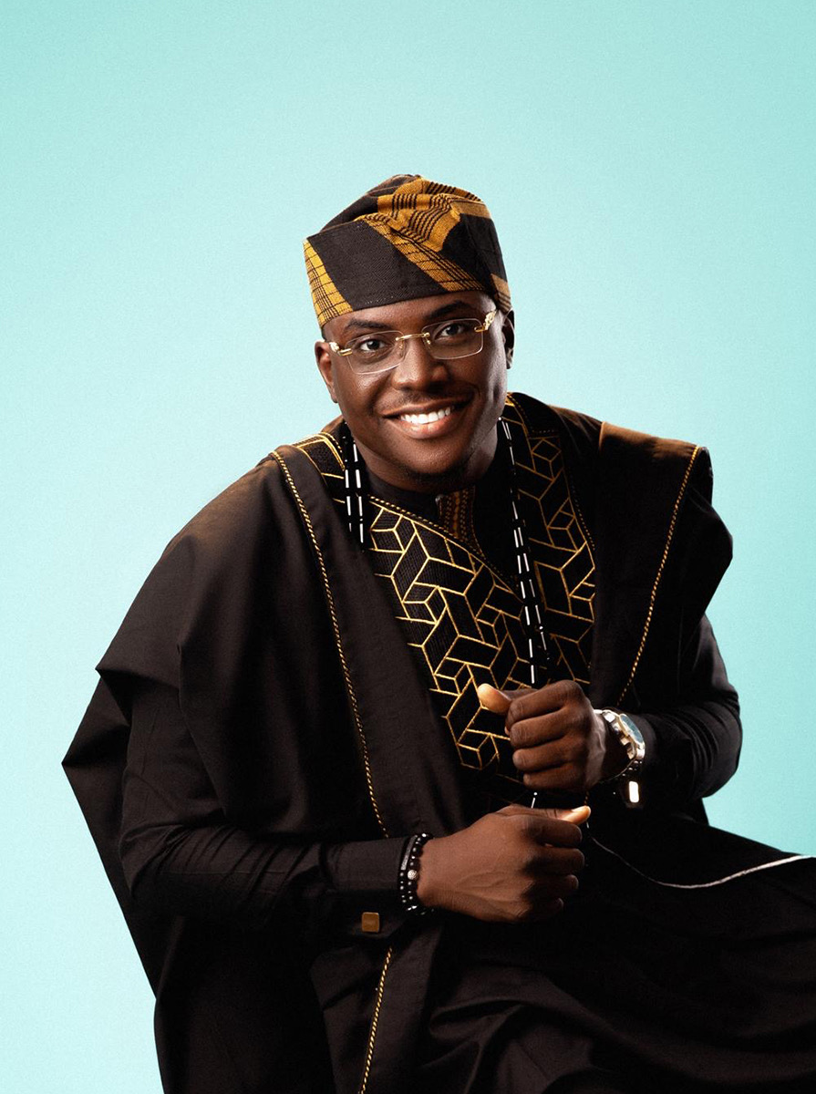Alex Adekunle, founder of Vavinix, in black and gold agbada